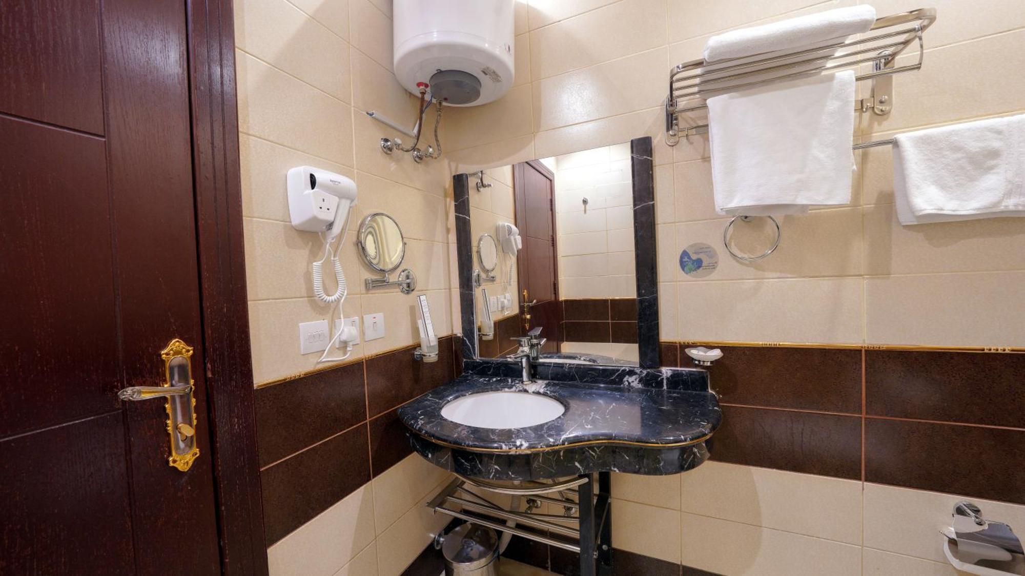Al Masem Serviced Apartments - Exit 9 Рияд Стая снимка